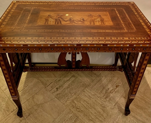A French Egyptian Revival table in exotic wood. Early 20th c