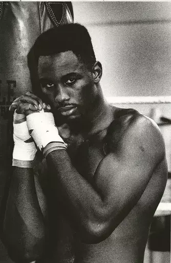 Norman LOMAX - Fotografia - Lennox Lewis, Boxing heavy-weight world champion (1990)
