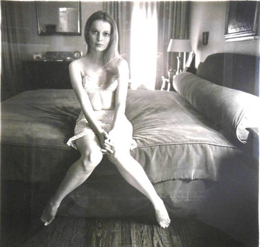 Diane ARBUS - Photo - Mia Villiers-Farrow on a bed