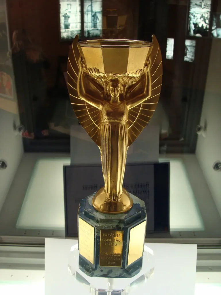 FIFA World Cup Trophy: history, design and portrait of sculptor Silvio  Gazzaniga
